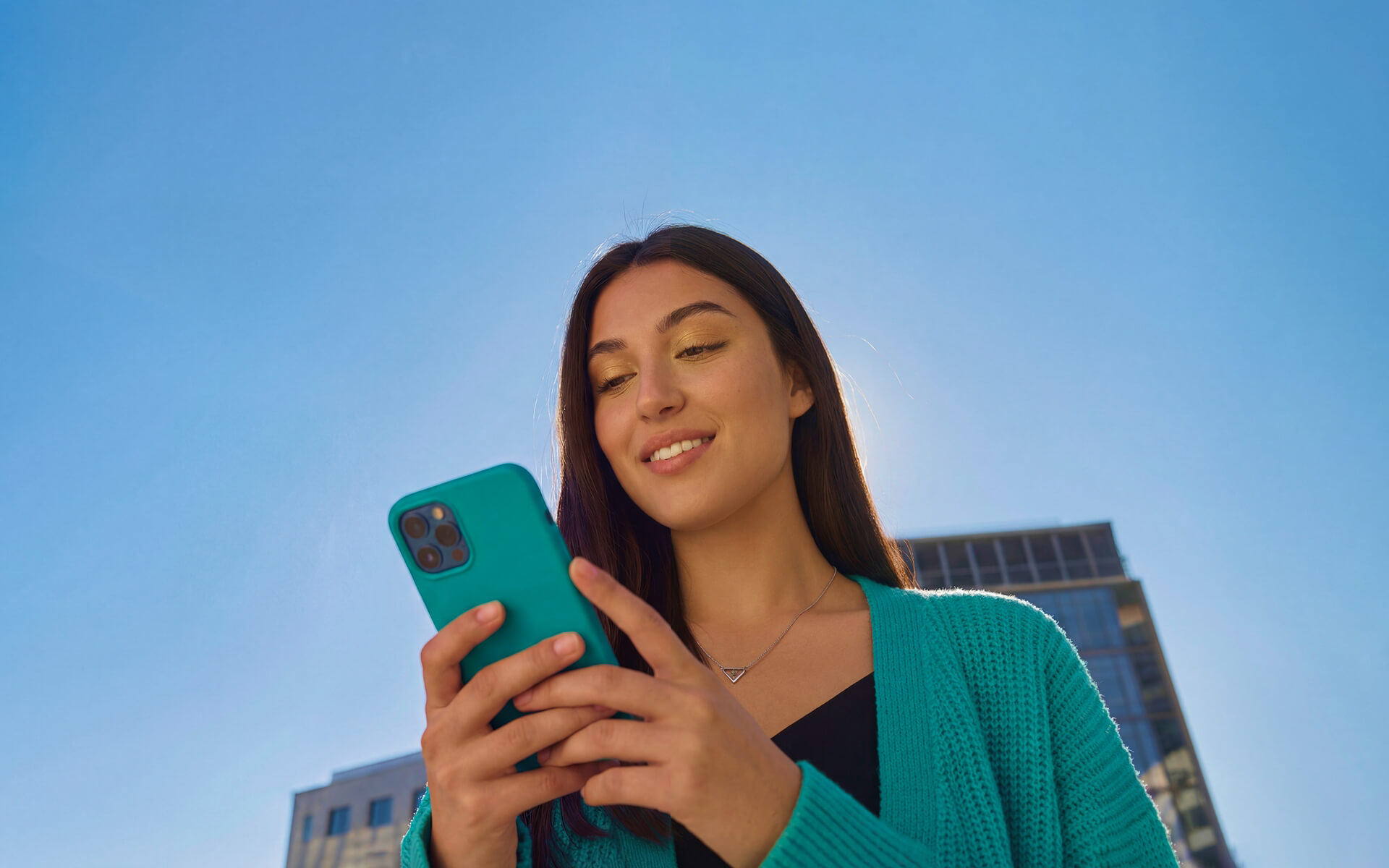 Young woman using phone